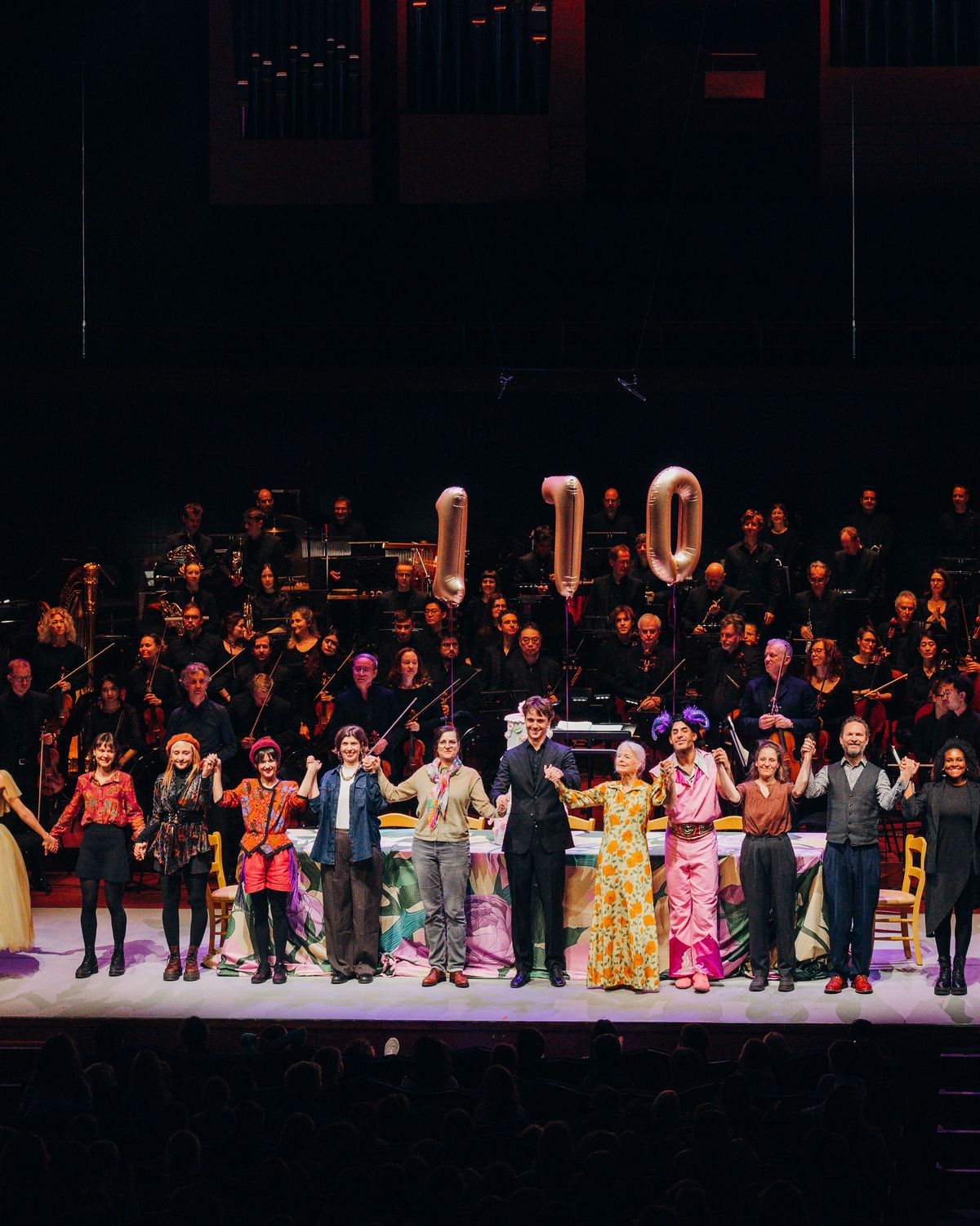 Curtain call: the whole cast and orchestra on the stage of the Philharmonie.