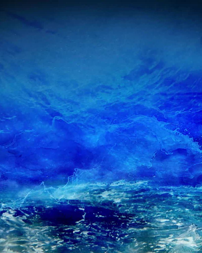 Video projection: a breaking wave on the open ocean.
